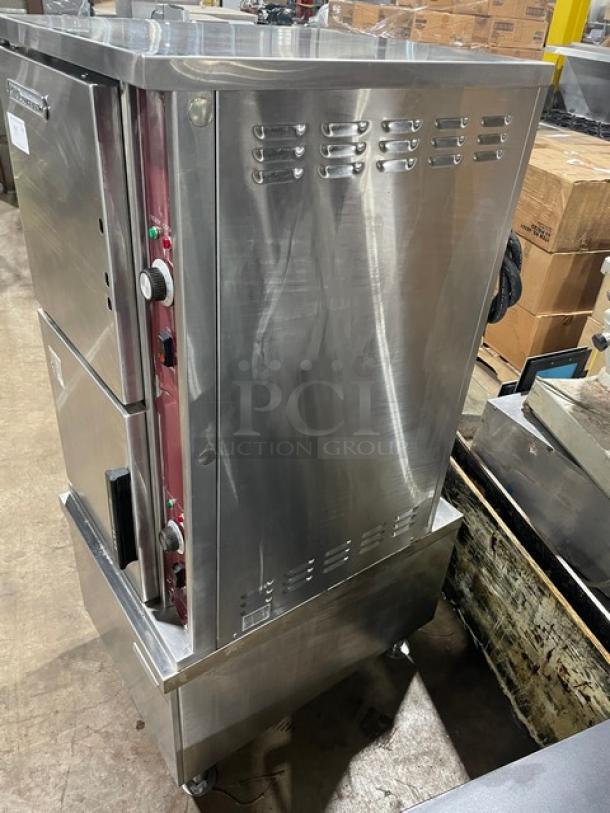 Southbend SX55EC dual compartment stainless steel convection steamer with enclosed cabinet base. 208V 3 Phase. On legs.