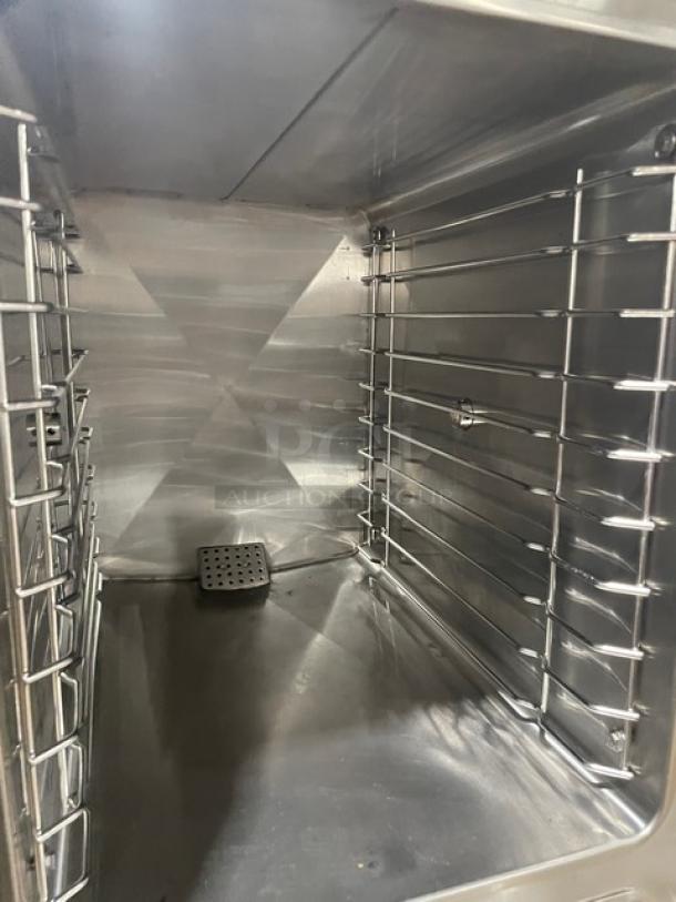 Southbend SX-55EC electric convection steamer interior, stainless steel, dual compartment, cabinet base, model SN: 93430-8LL-2809.