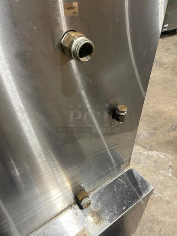 Southbend SX55EC stainless steel dual compartment convection steamer with enclosed cabinet base, on legs, in used condition.
