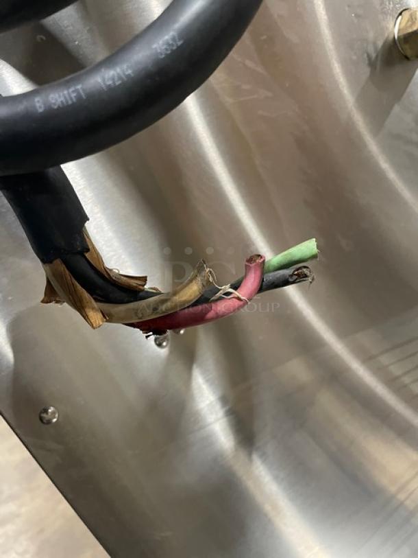 Damaged power cable of a Southbend SX55EC commercial stainless steel convection steamer, showing exposed wires.