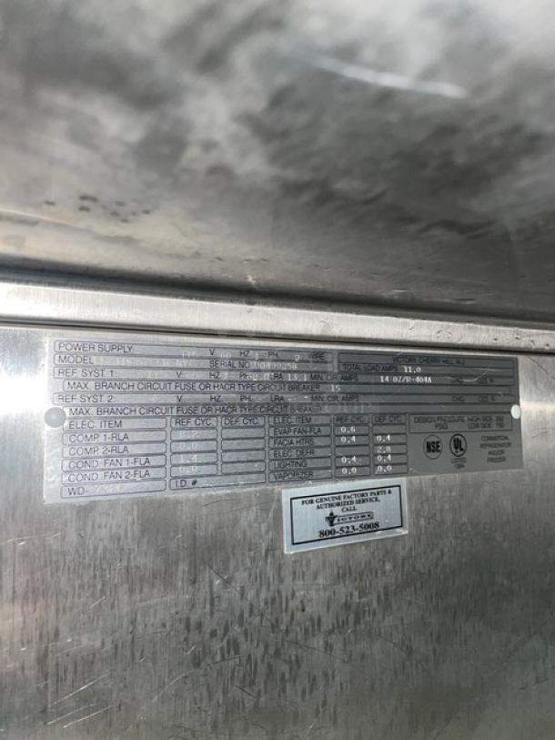 Victory Commercial Stainless Steel Reach-In Freezer FS1DS7FW, tag showing model, serial number D0499258, and specs, UL listed.