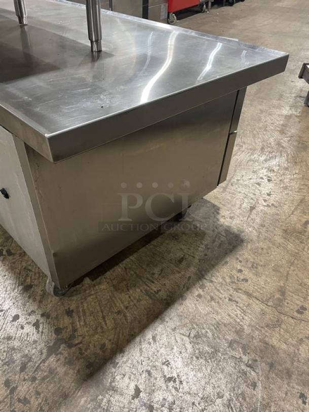 True TRCB-52-60 commercial stainless steel 2-drawer refrigerated chef base, oversized worktop, on casters, 115V, good condition.
