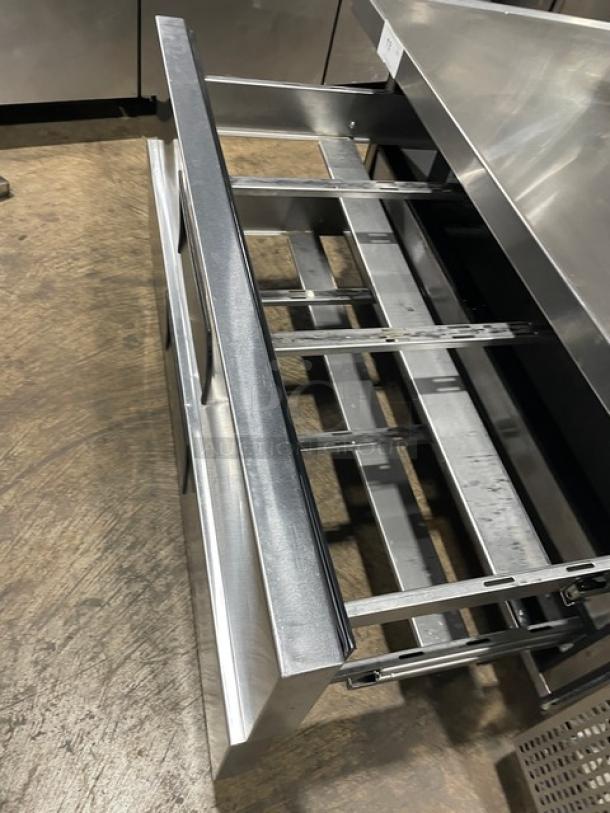 True Commercial Stainless Steel 2 Drawer Refrigerated Chef Base, Model TRCB-52-60, with oversized worktop. 115V, 1 Phase, on casters.