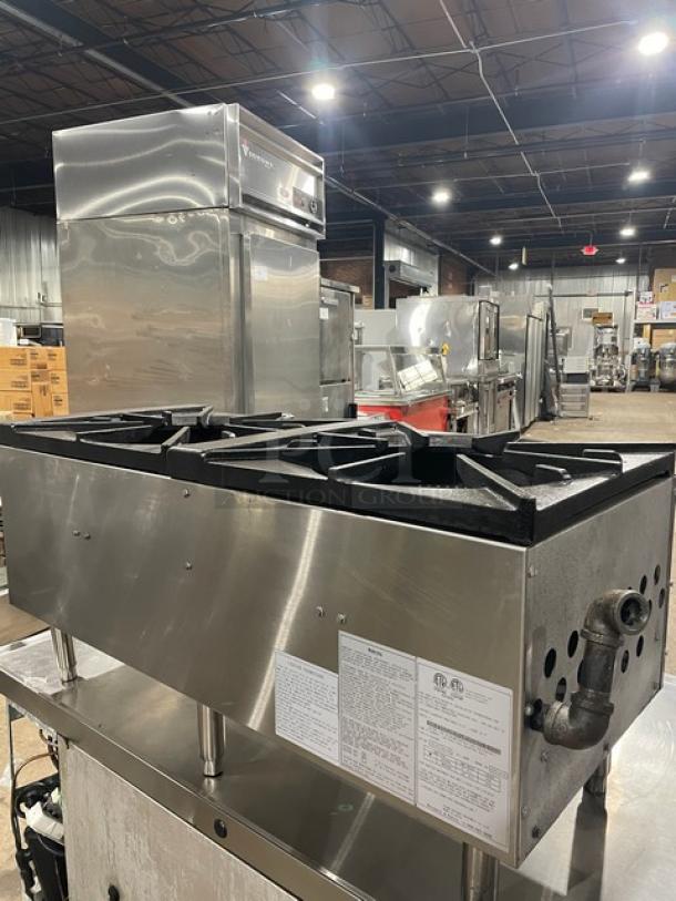 CookRite ATSP-18-2L stainless steel countertop double burner stock pot range, natural gas, on legs, with heavy-duty cast iron 3-ring burners, in good condition.