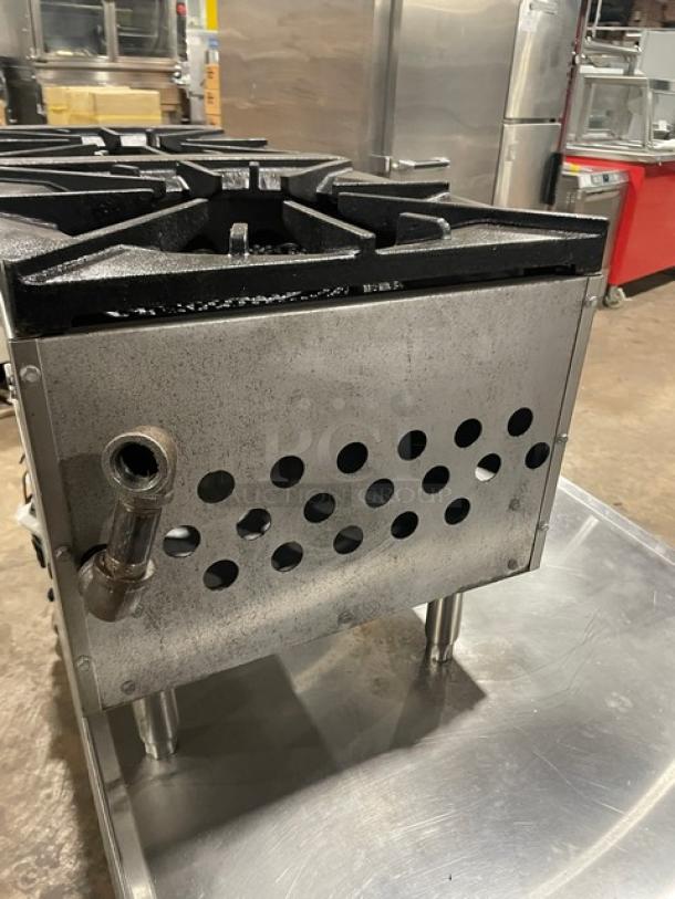 CookRite stainless steel double burner stock pot range, model ATSP-18-2L, with cast iron burners, on legs, natural gas powered.