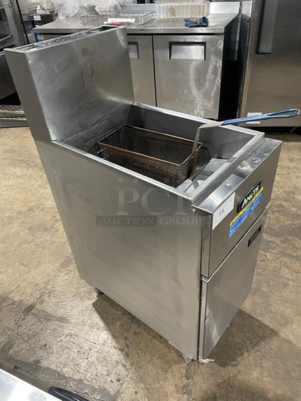 Anets SLG40 stainless steel 40 lb. deep fat fryer with backsplash, frying basket, on legs; natural gas powered.