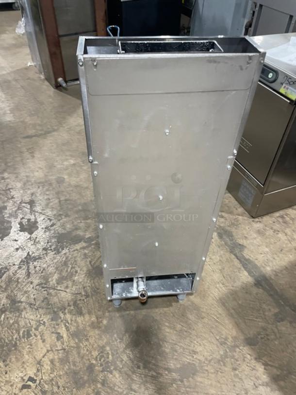 Anets SLG40 stainless steel 40 lb. deep fat fryer on legs, with backsplash and frying basket, in used condition.