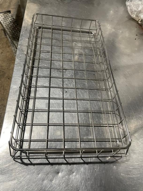 Commercial chrome plated full-sized bagel/pastry wired rack in excellent condition, featuring a sturdy wire grid design.