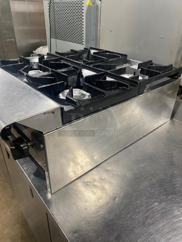 American Range commercial stainless steel countertop 4-burner natural gas range, excellent condition, durable cast-iron grates.