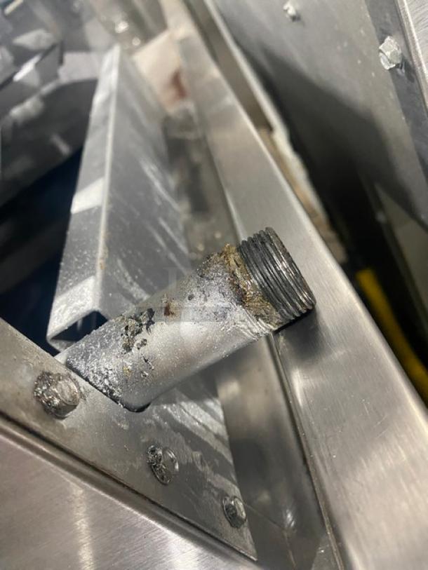 American Range commercial stainless steel natural gas countertop 4 burner range. Visible wear on burner connection.