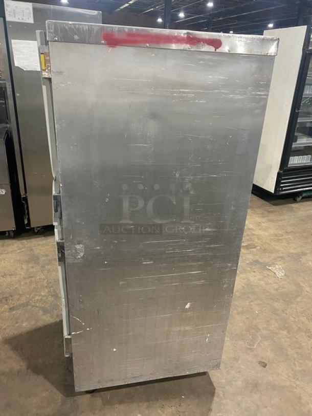 Metro Flavor Hold Series heated holding/proofing cabinet, model C199H1N, with half door, wide pan slides, and casters. Scratched exterior.
