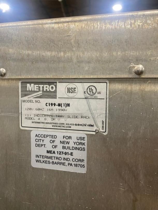 Metro Flavor Hold Single Section Heated Cabinet, Model C199H1N, 120V, on casters, label showing NSF and UL certifications.