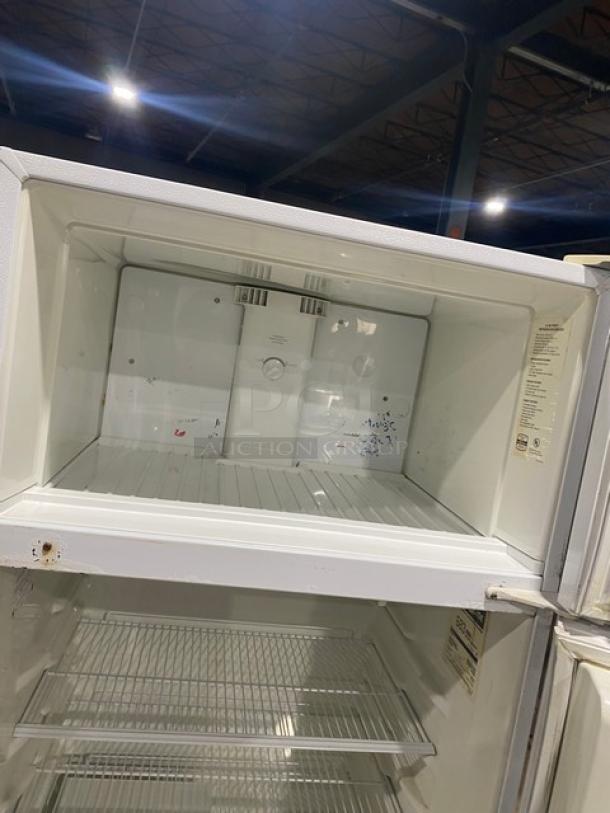 Frigidaire Commercial white reach-in top freezer/refrigerator combo, model MRT18DNEW, with adjustable shelving, lightly worn.