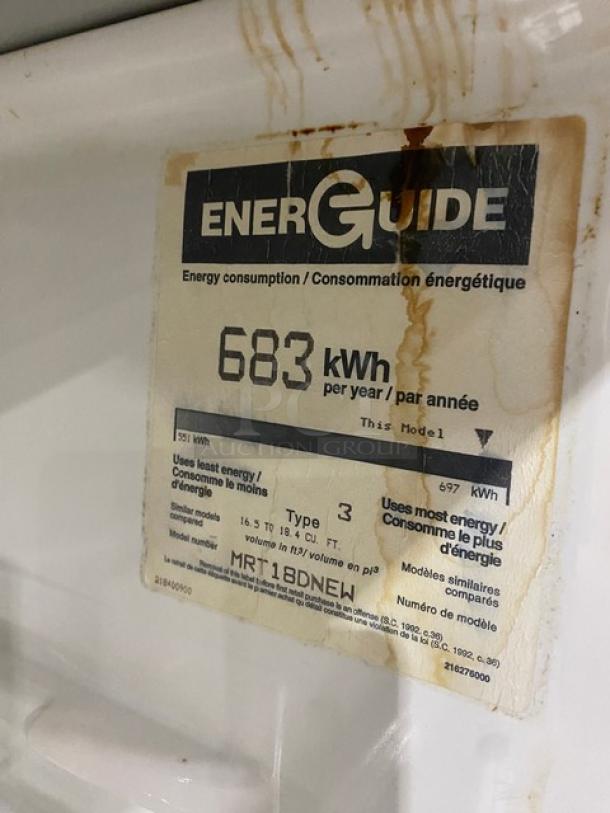 Frigidaire MRT18DNEW refrigerator energy guide showing 683 kWh/year consumption. Features adjustable shelving.