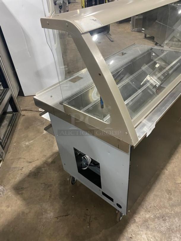 Duke SUBCPTC60 sandwich prep table, black powder-coated stainless steel, tri-channel cold pan, angled sneeze guard, on casters.