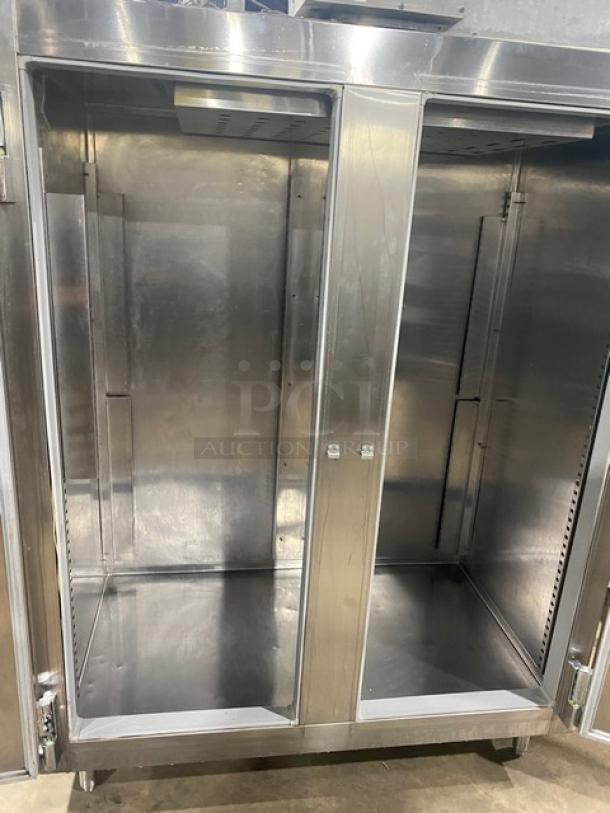McCall Commercial Stainless Steel Double Door Reach-In Freezer, Model 11045F, on legs, 115V, 1 Phase, excellent condition.