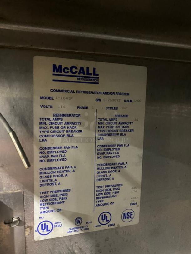 McCall stainless steel double door freezer, model 11045F, serial S-753092, 115V 1 phase, with specifications label.