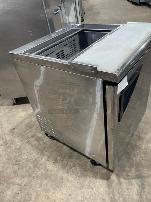 Turbo Air TST-28SD stainless steel refrigerated prep table with cutting board, 115V, on casters, in good condition.