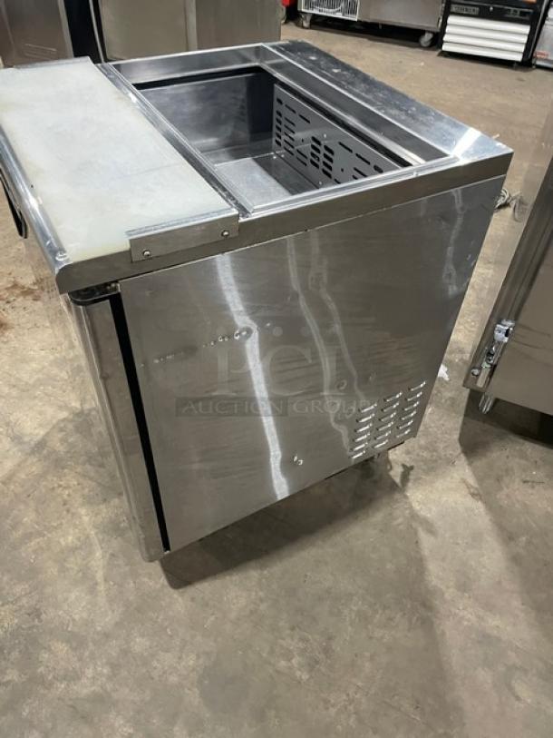 Turbo Air TST-28SD refrigerated salad/sandwich prep table, stainless steel, with cutting board, on casters, 115V, 1 phase.