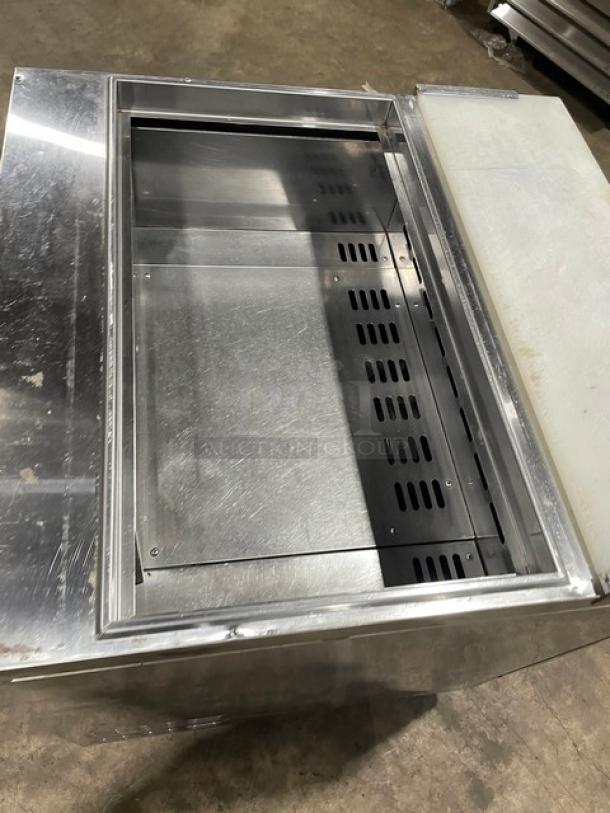 Turbo Air TST-28SD refrigerated prep table, stainless steel, with cutting board, on casters, model TST28SD, 115V 1 Phase.