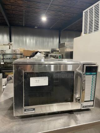Sharp R25JTF commercial stainless steel countertop microwave, 2020 model, with digital controls, 208/230V, in good condition.
