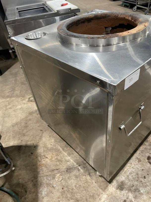 Commercial stainless steel tandoor oven on casters, natural gas/charcoal powered, Indian style, clay-lined interior.