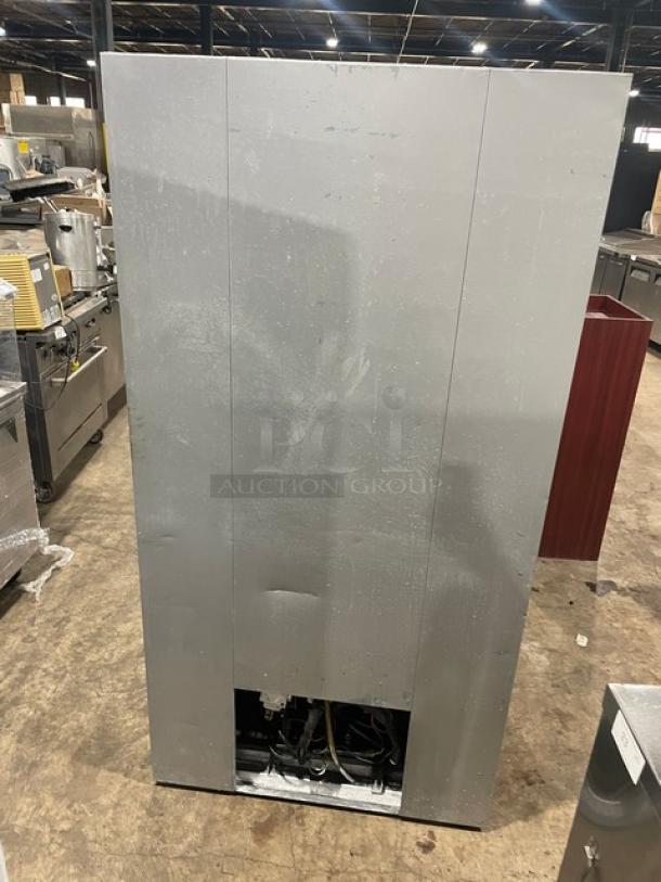 Leader stainless steel reach-in merchandiser refrigerator, double glass sliding doors, poly-coated wire racks, 115V, 1 phase.