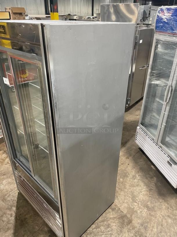 Leader commercial stainless steel reach-in refrigerator with double glass sliding doors, poly coated wire racks, and 115V 1 phase power.