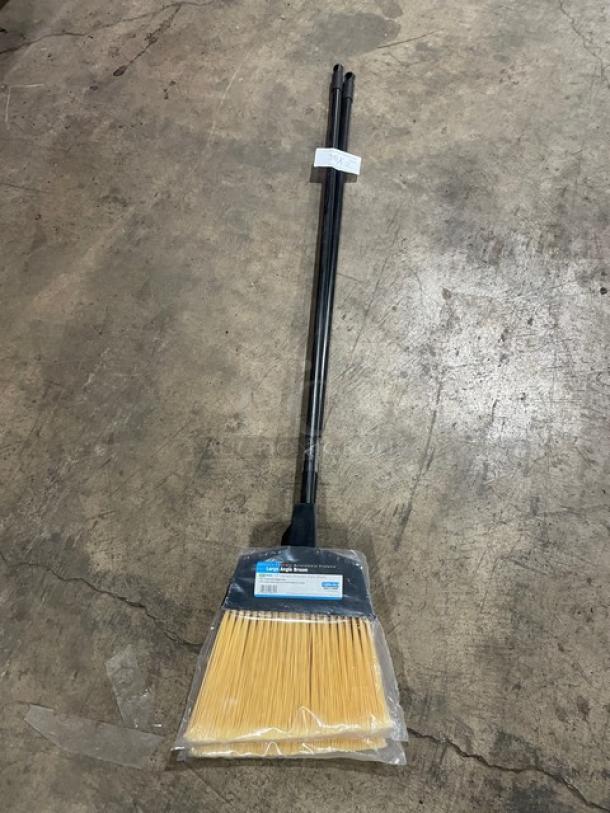 Carlisle 12" Upright Shrouded Angle Broom, new condition, black grip handle, labeled packaging, durable design.