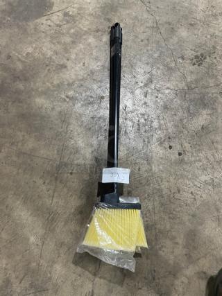 New commercial floor broom with black grip handle, yellow bristles, and a label indicating "3X Your Bid." Packaged and unused.