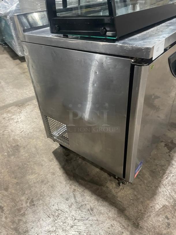 Turbo Air Super Deluxe 72" Worktop Refrigerator, Model TWR72SDN, stainless steel, 3-door, with 3.5" backsplash, on casters.