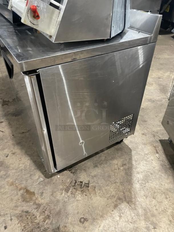 Turbo Air Super Deluxe 3-door stainless steel worktop refrigerator, model TWR-72SD-N, with 3.5” backsplash, on casters.