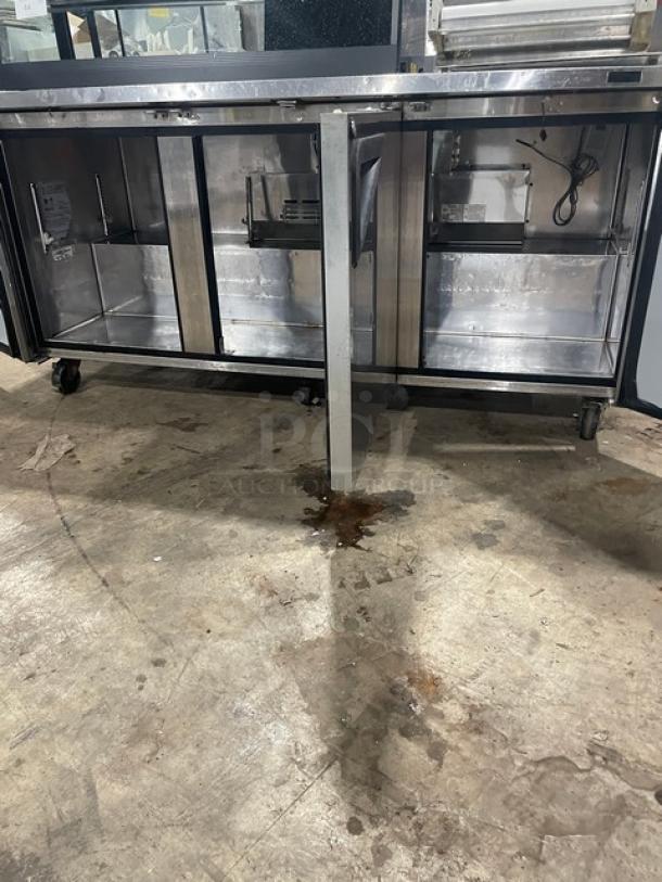 Turbo Air Super Deluxe 72" stainless steel worktop refrigerator, model TWR-72SD-N, with 3 doors and 3.5" backsplash, on casters.