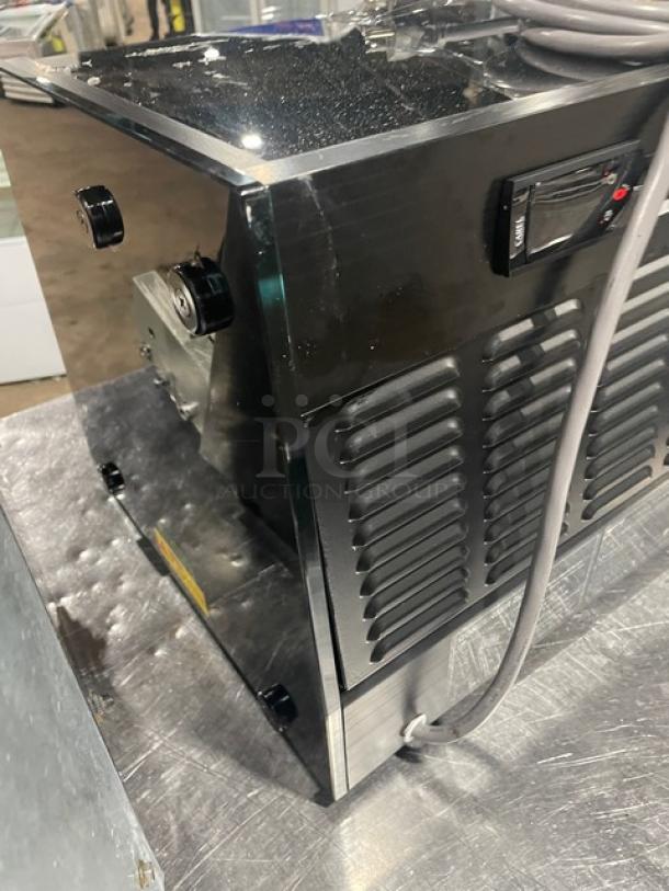 Turbo Air refrigerated sushi display case, black finish, rear sliding doors, countertop model, cords attached, lightly used.