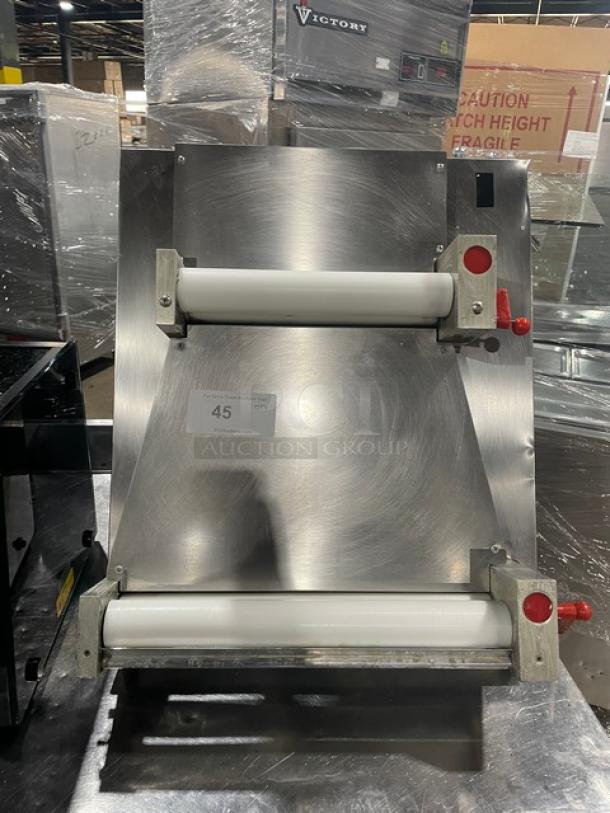 Commercial stainless steel electric countertop dough sheeter with dual rollers, pristine condition, labeled as item 45.