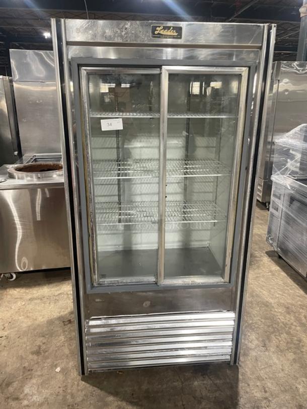 Leader stainless steel double glass sliding door reach-in merchandiser refrigerator with poly-coated wire racks, 115V 1 phase.