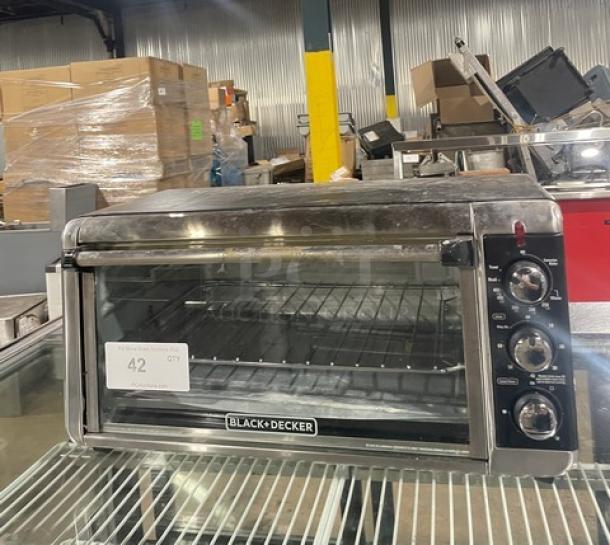 BLACK+DECKER TO3250XSB convection toaster oven, stainless steel, electric, extra-wide, model TO3250XSB, 120V, on legs.