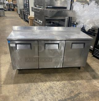 True Commercial Stainless Steel 3-Door Refrigerated Worktop Table, Model TWT-72, Energy Star, with Upturned Back Splash, on Casters.
