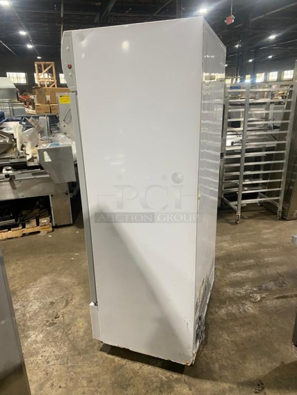 Commercial white double glass swing-door reach-in merchandiser refrigerator, Model LG-800BF, with poly coated wire racks, 220V.