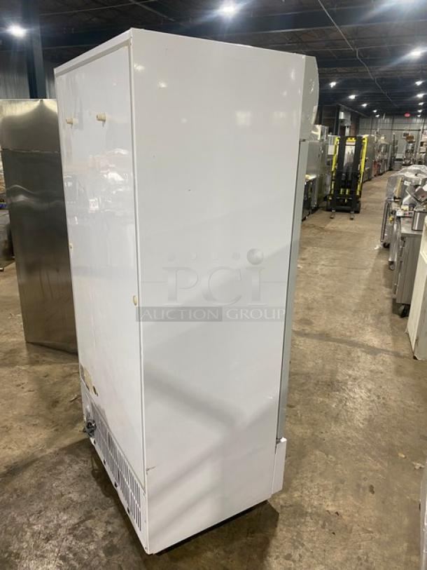 Commercial double glass swing-door refrigerator, Model LG-800BF, white, poly-coated wire racks, 220V, for merchandizing.