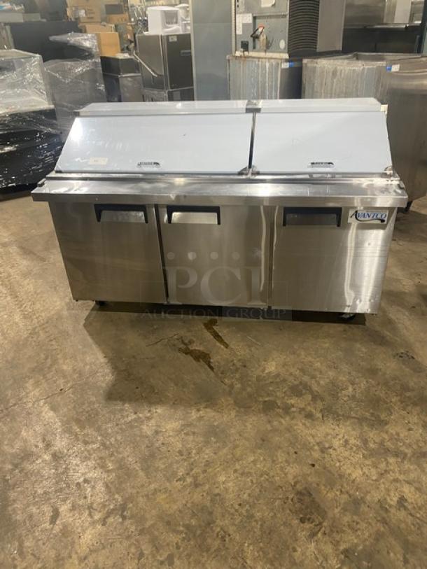 Avantco 3-door stainless steel refrigerated prep table, model APT-71M-HC, on casters; excellent condition.