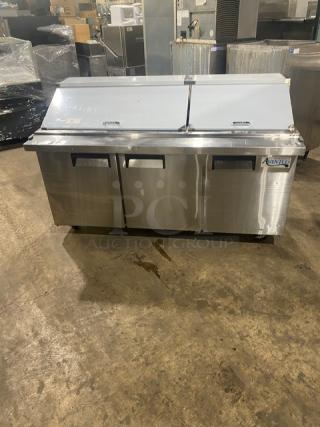 Avantco 3-door stainless steel refrigerated prep table, model APT-71M-HC, on casters; excellent condition.