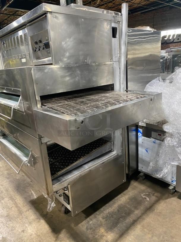 Middleby Marshall stainless steel double stacked electric conveyor pizza oven on casters, commercial use, good condition.