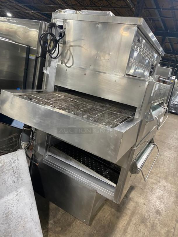 Middleby Marshall commercial stainless steel double-stacked conveyor pizza oven on casters, electric-powered, excellent condition.