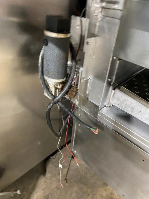 Middleby Marshall commercial stainless steel double-stacked electric conveyor pizza oven on casters, showing wiring and metal finish.
