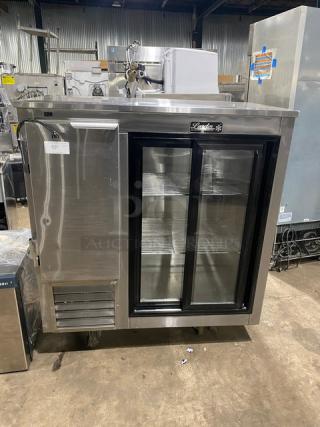 Leader Commercial Stainless Steel 2 Door Refrigerated Lowboy, Model LB48SC, includes chrome plated wire rack, on casters.