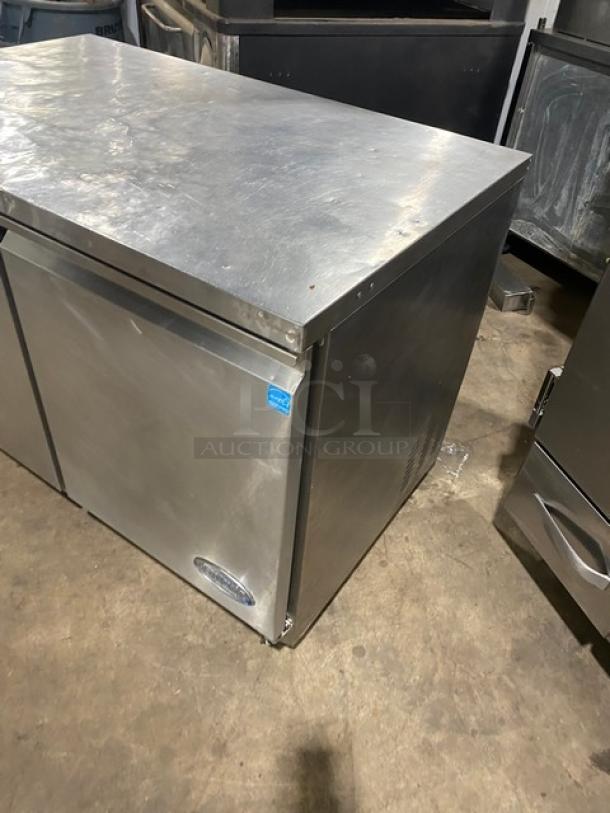 Entree 2-door undercounter stainless steel refrigerator, Model UR48-Q, Energy Star certified, on casters, in good condition.