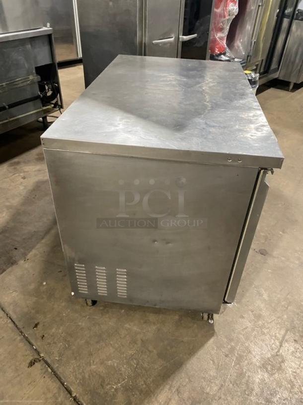 Entree UR48Q stainless steel 2-door undercounter refrigerator with worktop. Energy Star certified, on casters, good condition.