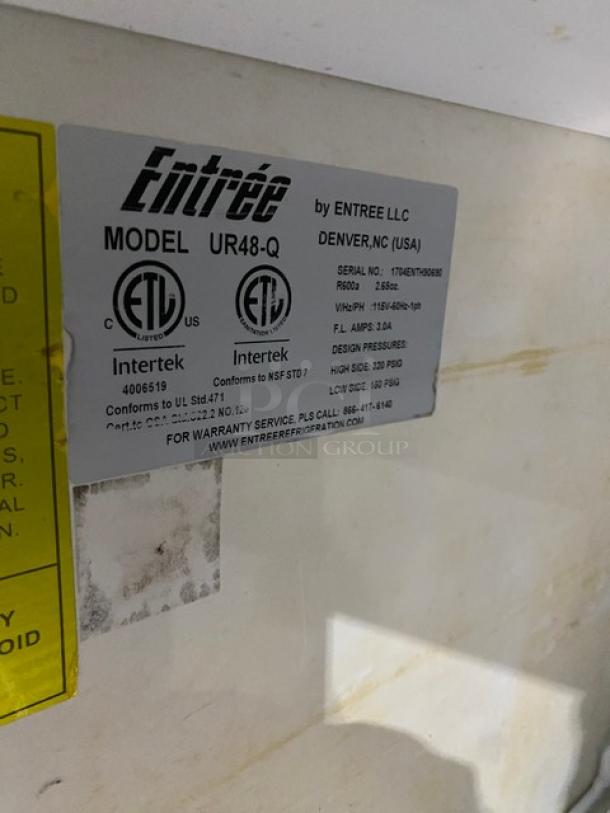 Entree stainless steel 2-door undercounter refrigerator, model UR48-Q, Energy Star certified, on casters. Serial: 1704ENTH90690.