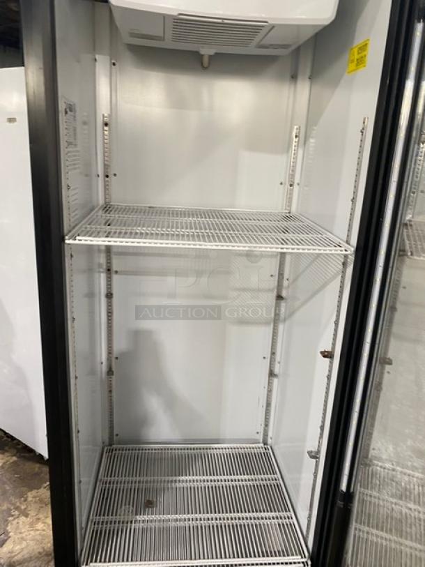 Kool-It LX-24R black single glass door reach-in merchandiser refrigerator with poly-coated wire racks, on casters, model 2022.